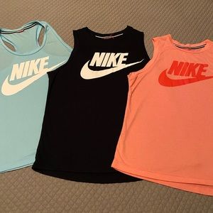 3 NIKE tank tops loose fit. Size Medium
